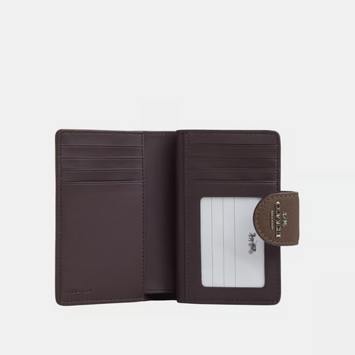 COACH
Medium Corner Zip Wallet in Pebbled Leather